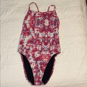 Pink patterned Jolyn Clothing onesie fixed back